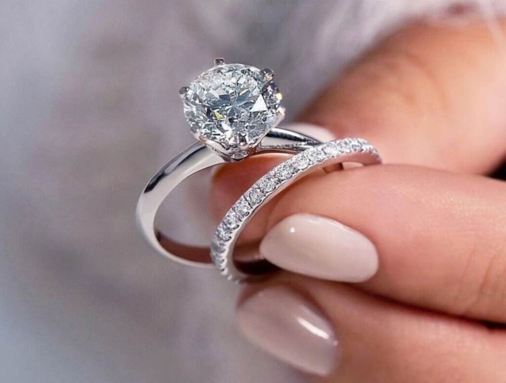 Someone holding a Diamond ring